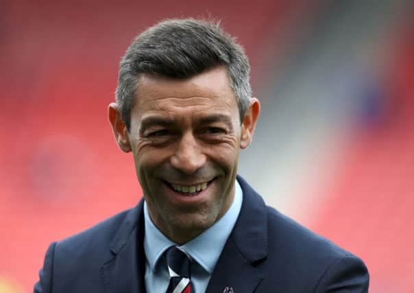 Pedro Caixinha's Rangers will be playing Europa League football next term after their dramatic late win over Partick Thistle: Picture Andrew Milligan/PA Wire