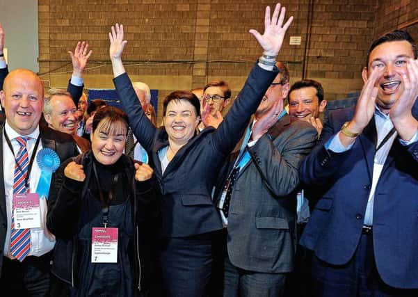 Ruth Davidson celebrates with newly elected Tory councillors at Meadowbank Stadium, Edinburgh. Picture: Neil Hanna