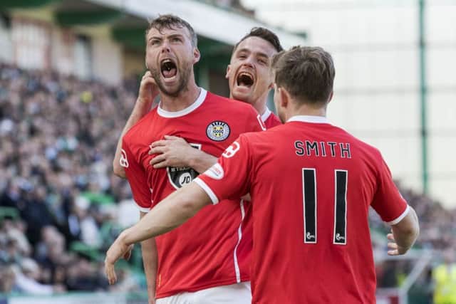 St Mirren's Rory Loy celebrates after he scoring the goal which ensured St Mirren's survival in the Championship. Pic: SNS/Alan Rennie
