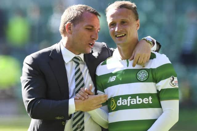 Celtic manager Brendan Rodgers (left) with Leigh Griffiths after Saturday's win over St Johnstone. Picture: SNS