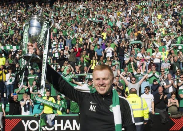 Neil Lennon celebrates with the fans basking in the sunshine on Leith. Pic: SNS/Alan Harvey