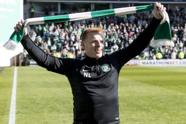 Neil Lennon basks in the celebrations and sunshine, with a smile on his face. Pic: SNS/Alan Rennie