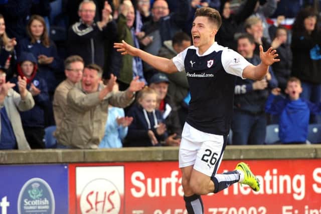 Jonny Court celebrates his openeing goal. Manager John Hughes, below, hailed Raith Rovers commitment.  
Photograph: Walter Neilson.