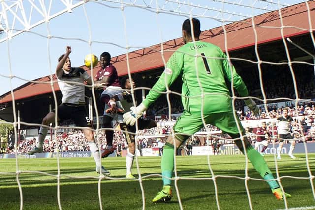 Isma Goncalves scores the Hearts equaliser against Aberdeen in front of Archibald Leitchs stand. Picture: SNS