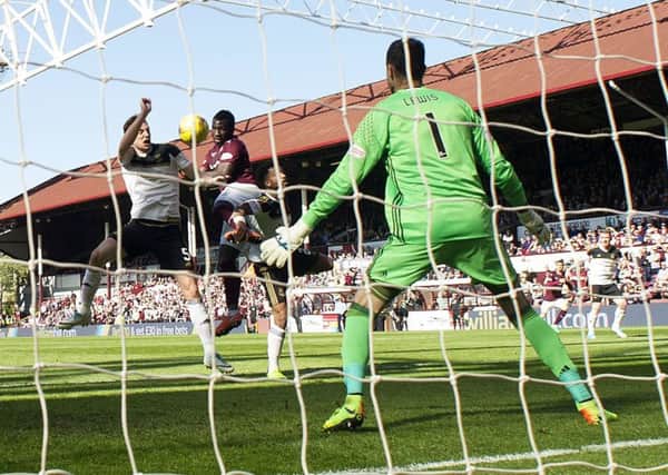 Isma Goncalves scores the Hearts equaliser against Aberdeen in front of Archibald Leitchs stand. Picture: SNS