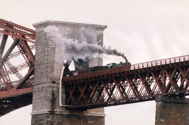 Steam train crossing the Forth Rail Bridge Picture: TSPL