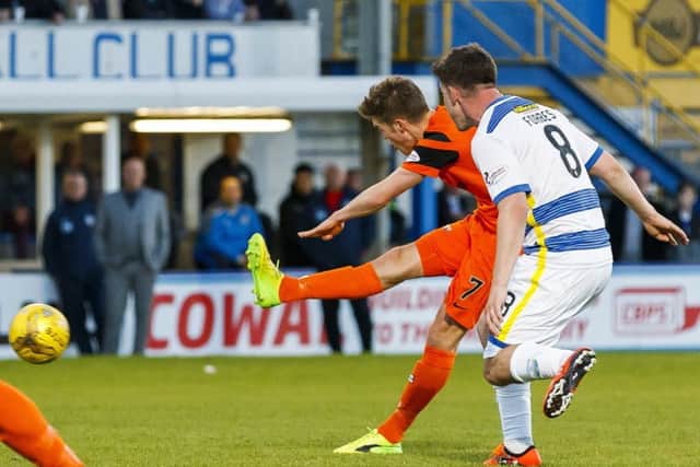 Blair Spittal strikes the winner for Dundee United at Cappielow last night. Picture: SNS.