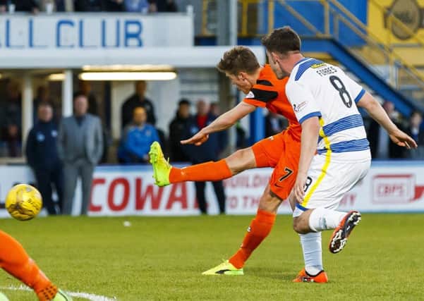 Blair Spittal strikes the winner for Dundee United at Cappielow last night. Picture: SNS.