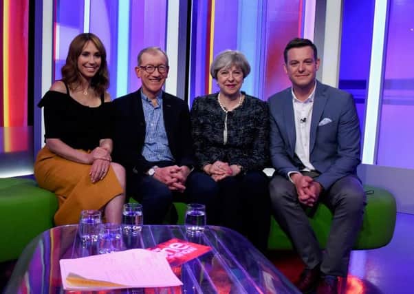 Prime Minister Theresa Mayand her husband Philip Jon May  pose for a photograph with the hosts of the BBC's The One Show, Matt Baker and Alex Jones. Picture Getty