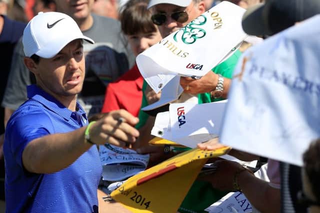 Rory McIlroy signs autographs in the build up to this week's Players Championship at Sawgrass. Picture: Getty Images