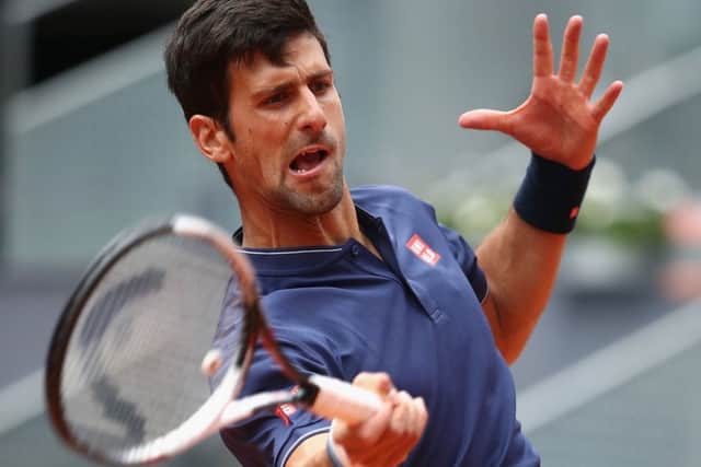 Novak Djokovic plays a forehand during his match against Nicolas Almagro. Picture: Julian Finney/Getty Images