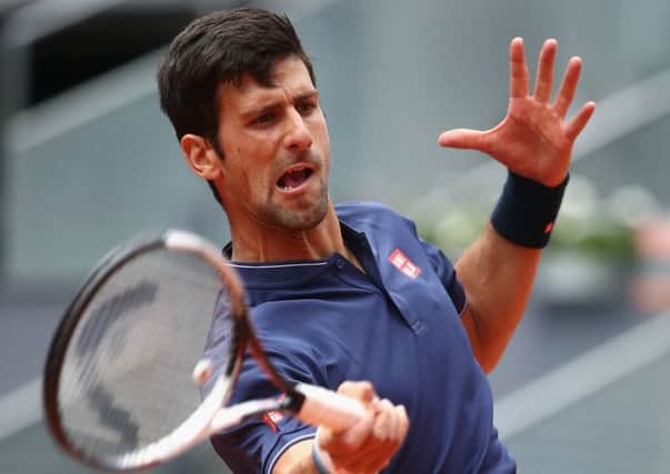Novak Djokovic plays a forehand during his match against Nicolas Almagro. Picture: Julian Finney/Getty Images