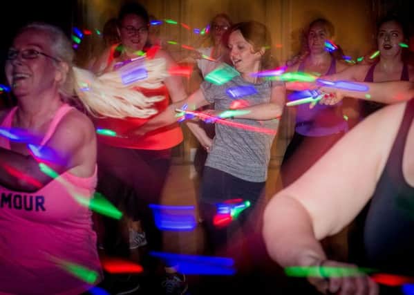 Jane Bradley joins in with the regulars at a Clubbercise class at Murrayfield church hall in Edinburgh. Photograph: Ian Georgeson