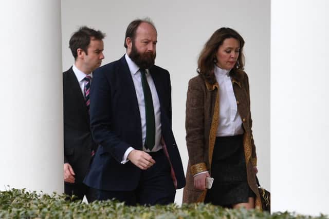 Joint-chiefs of staff Fiona Hill (right) and Nick Timothy (centre) follow Prime Minister Theresa May and US President Donald Trump along the White House Colonnade during her visit to Washington DC, USA. Picture: Stefan Rousseau