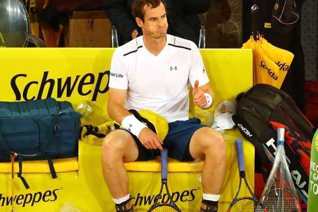 Andy Murray of Great Britain gives a less-than-enthusiastic thumbs up to his coaching staff. Picture: Clive Rose/Getty Images