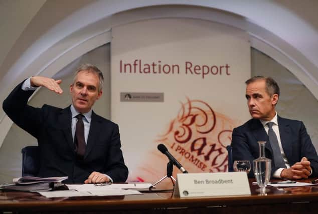 Bank of England Governor Mark Carney (right) listens as Deputy Governor for Monetary Policy Ben Broadbent speaks during the central Bank's quarterly Inflation Report press conference. Picture: Adrian Dennis/AP