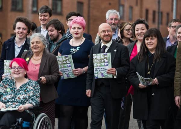 Patrick Harvie, co-convener of the Scottish Greens, with a number of the party's council hopefuls earlier this month. Picture: John Devlin