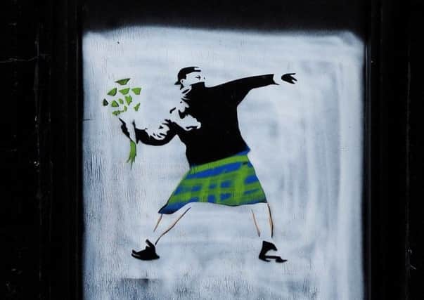 A 'Banksy' mural spotted in Kirkcaldy. Picture: SWNS