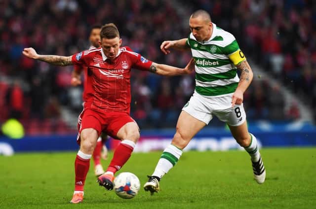 Aberdeen's Jonny Hayes and Celtic's Scott Brown in action during the Betfred Cup final. Picture: SNS