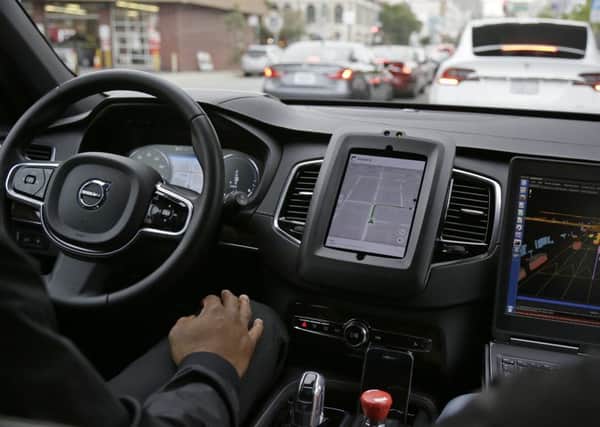 An Uber driverless car waits in traffic during a test drive in San Francisco. Picture: AP