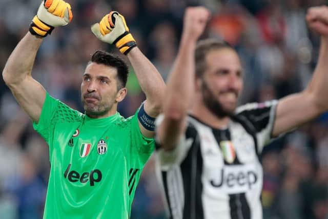 Gianluigi Buffon celebrates reaching the Champions League final.  (Photo by Emilio Andreoli/Getty Images)