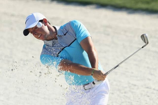 Rory McIlroy plays out of a bunker at the 11th hole in yesterdays second round at Sawgrass. Picture: Getty.