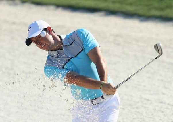 Rory McIlroy plays out of a bunker at the 11th hole in yesterdays second round at Sawgrass. Picture: Getty.