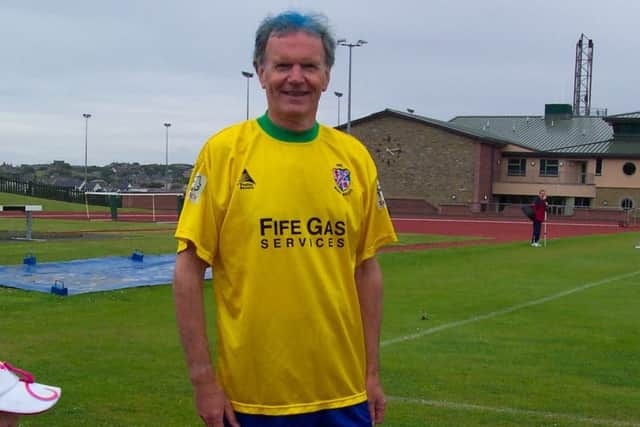 Minister and author Ron Ferguson proudly sports the famous Brazil-style away kit of his beloved Cowdenbeath.