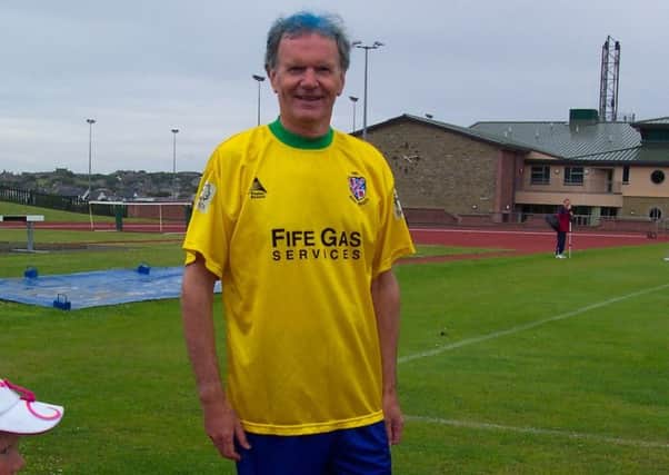 Minister and author Ron Ferguson proudly sports the famous Brazil-style away kit of his beloved Cowdenbeath.