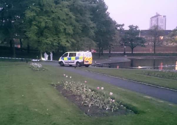 Police on the scene. The park's pond wasc ordoned off. Picture: Twitter/Feargal Dalton