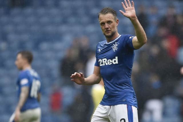 Clint Hill applauds the fans after a man of the match performance. Pic: SNS/Rob Casey
