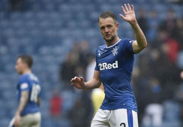 Clint Hill applauds the fans after a man of the match performance. Pic: SNS/Rob Casey