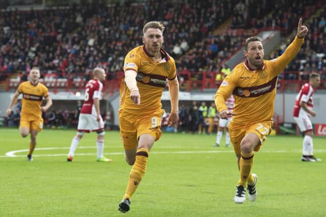 Motherwell's Louis Moult celebrates after netting what proved to be the winner. Pic: SNS/Alan Harvey