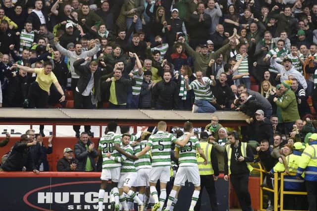 Celtic celebrate Stuart Armstrong's goal with the fans. Pic: SNS/Craig Williamson