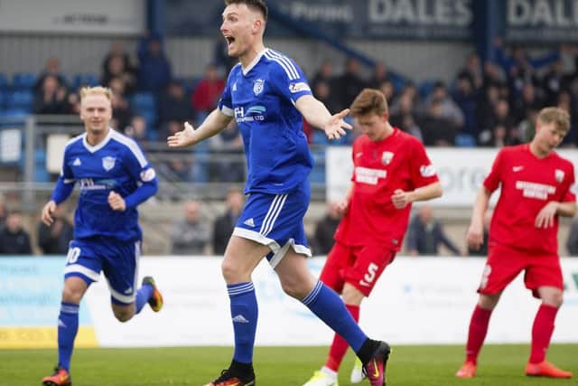 Peterhead's Rory McAllister celebrates after he scores a penalty for his side. Picture: Graham Stuart/SNS