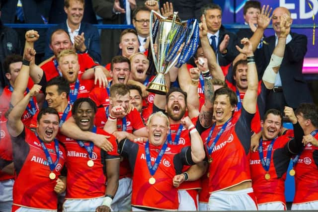 Sracens celebrate their victory at Murrayfield with the Champions Cup. Picture: SNS.