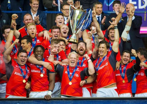 Sracens celebrate their victory at Murrayfield with the Champions Cup. Picture: SNS.