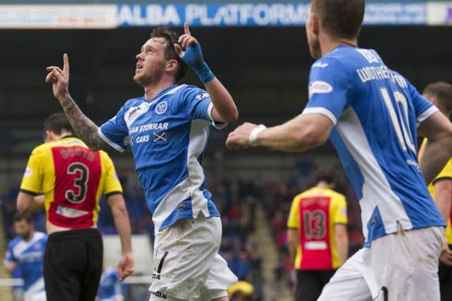 Danny Swanson celebrates scoring from the penalty spot against Partick Thistle. Picture: SNS.