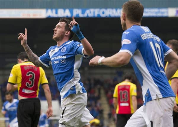 Danny Swanson celebrates scoring from  the penalty spot against Partick Thistle. Picture: SNS.