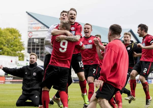 Brechin City players dance with joy following their shoot-out victory over Raith Rovers. Picture: SNS.