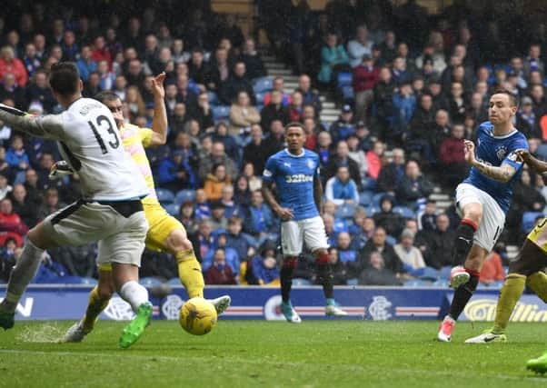 Barrie McKay drills the ball into the net to give Rangers a 2-1 win. Picture: SNS.