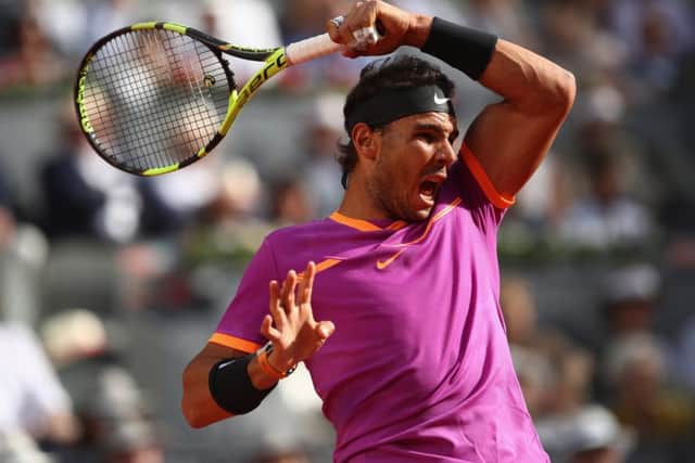 Rafael Nadal unleashes a forehand return to Dominic Thiem during the final of the Mutua Madrid Open. Picture: Getty.