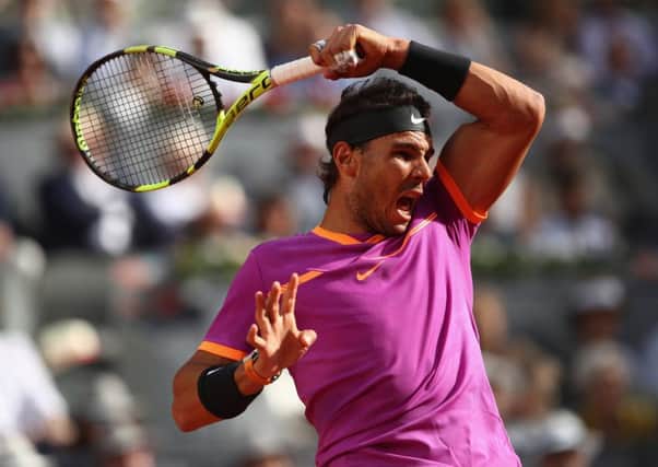 Rafael Nadal unleashes a forehand return to Dominic Thiem during the final of the Mutua Madrid Open. Picture: Getty.