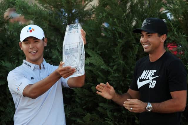 South Korea's Si Woo Kim after receiving the trophy from defending champion Jason Day at Sawgrass. Picture: Getty Images