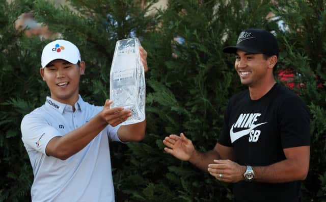 South Korea's Si Woo Kim after receiving the trophy from defending champion Jason Day at Sawgrass. Picture: Getty Images