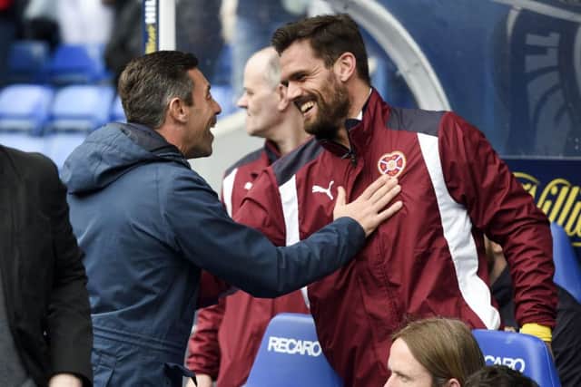 Rangers manager Pedro Caixinha with Hearts' Alexandros Tziolis. Pic: SNS/Craig Williamson