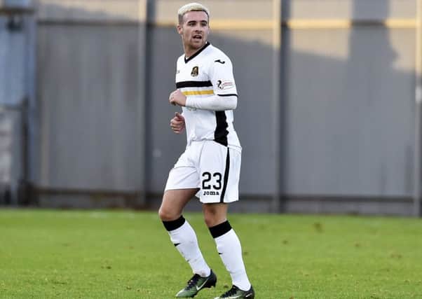Lewis Vaughan in action for Dumbarton. Pic: SNS/Rob Casey