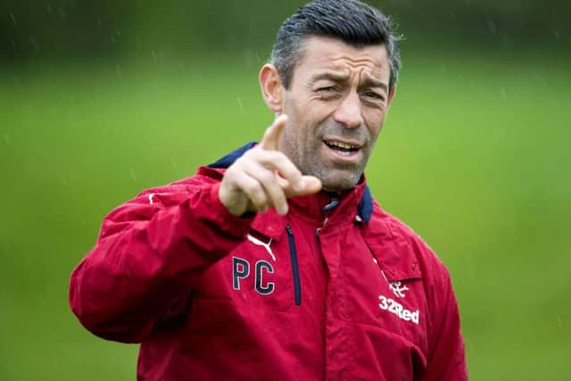 Rangers manager Pedro Caixinha directs training  yesterday ahead of tomorrows game against Aberdeen. Picture: SNS.