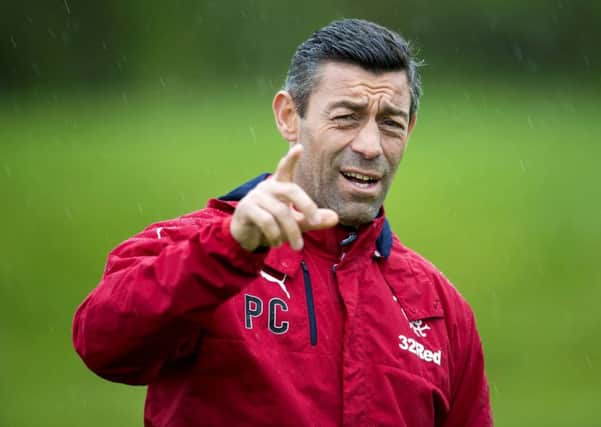 Rangers manager Pedro Caixinha directs training  yesterday ahead of tomorrows game against Aberdeen. Picture: SNS.