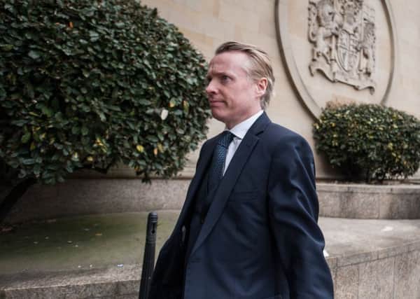 Former Rangers owner Craig Whyte arrives at the High Court in Glasgow.